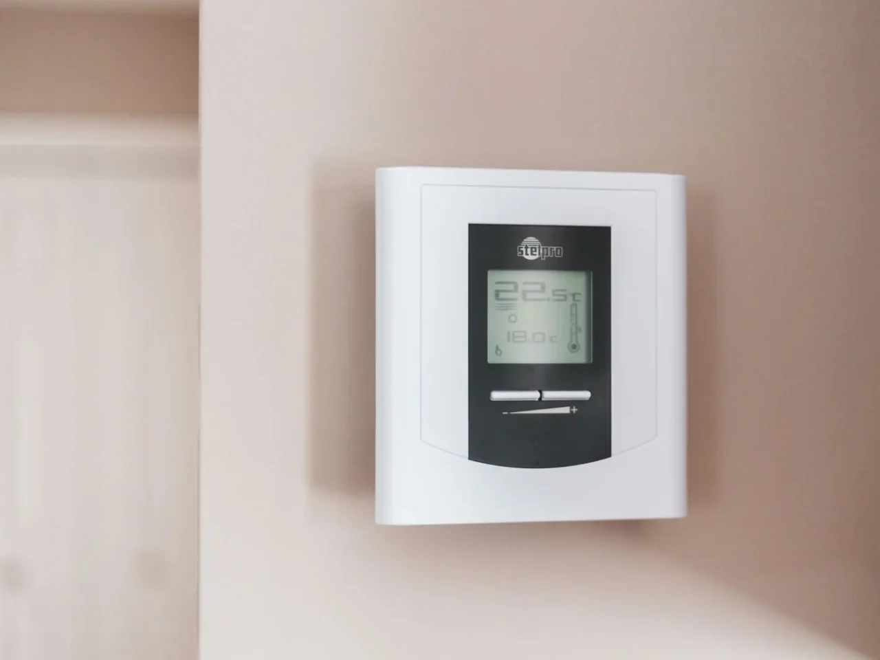 Digital wall thermostat close-up